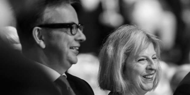 MANCHESTER, ENGLAND - OCTOBER 02: (EDITOR'S NOTE: Image was processed using digital filters. Colour version not available) Cabinet Ministers Michael Gove (L), Theresa May and George Osborne laugh as British Prime Minister David Cameron delivers his keynote speech to delegates on the last day of the annual Conservative Party Conference at Manchester Central on October 2, 2013 in Manchester, England. During his closing speech David Cameron said that his 'abiding mission' would make the UK into a 'land of opportunity'. (Photo by Christopher Furlong/Getty Images)