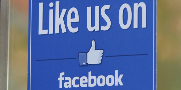FILE - In this Dec. 13, 2011 file photo, a sign with Facebook's "Like" logo is posted at Facebook headquarters near the office for the company's User Operations Safety Team in Menlo Park, Calif. After four months of testing outside the U.S., Facebook CEO Mark Zuckerberg said on Wednesday, Jan. 27, 2016, that "pretty soon" multiple new emotions will be added to the social network throughout the world. (AP Photo/Paul Sakuma, File)