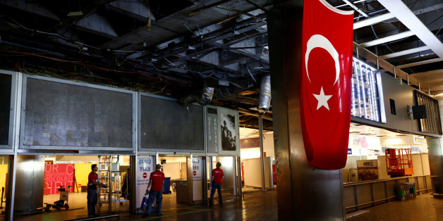 Workers repair the damaged parts of the terminal building at Turkey's largest airport, Istanbul Ataturk, Turkey, following Tuesday's blast, June 29, 2016. REUTERS/Murad Sezer