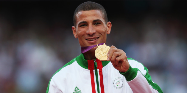 LONDON, ENGLAND - AUGUST 08: Gold medalist Taoufik Makhloufi of Algeria poses on the podium during the medal ceremony for the Men's 1500m on Day 12 of the London 2012 Olympic Games at Olympic Stadium on August 8, 2012 in London, England. (Photo by Quinn Rooney/Getty Images)