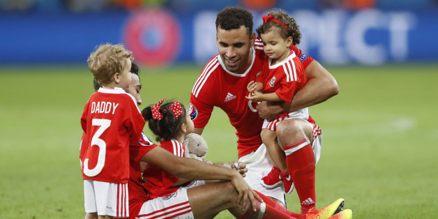 Football Soccer - Wales v Belgium - EURO 2016 - Quarter Final - Stade Pierre-Mauroy, Lille, France - 1/7/16Wales' Hal Robson-Kanu and Neil Taylor celebrate with children at full timeREUTERS/Carl RecineLivepic