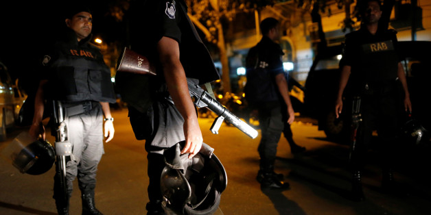 Security personnel keep watch, after gunmen stormed the Holey Artisan restaurant and took hostages, in the Gulshan area of Dhaka, Bangladesh July 2, 2016. REUTERS/Mohammad Ponir Hossain