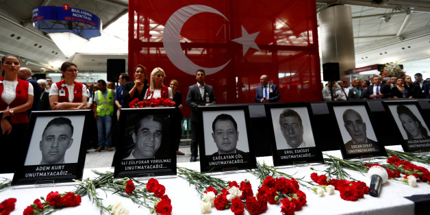 Airport employees attend a ceremony for their friends, who were killed in Tuesday's attack at the airport, at the international departure terminal of Ataturk airport in Istanbul, Turkey, June 30, 2016. REUTERS/Murad Sezer