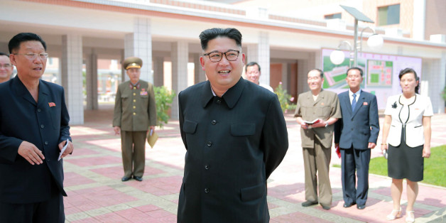 This undated picture released from North Korea's official Korean Central News Agency (KCNA) on July 3, 2016 shows North Korean leader Kim Jong-Un (C) inspecting a newly built secondary school in Pyongyang. / AFP / KCNA VIA KNS / KCNA (Photo credit should read KCNA/AFP/Getty Images)