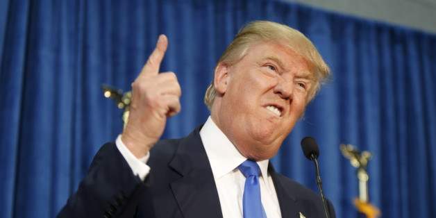 Republican presidential candidate Donald Trump gestures and declares "You're fired!" at a rally in Manchester, New Hampshire, June 17, 2015. REUTERS/Dominick Reuter BEST QUALITY AVAILABLE