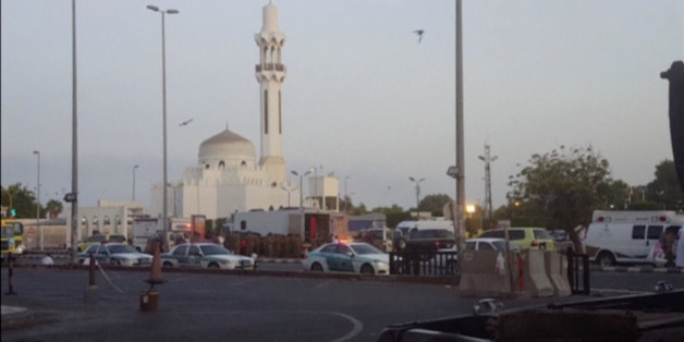 General view of security personnel in front of a mosque as police stage a second controlled explosion, after a suicide bomber was killed and two other people wounded in a blast near the U.S. consulate in Jeddah, Saudi Arabia, in this still frame taken from video July 4, 2016. REUTERS/REUTERS TV TPX IMAGES OF THE DAY