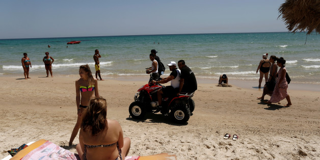 Tourist police members patrol at the beachside of El Ksar hotel in Sousse, Tunisia June 26, 2016. REUTERS/ Zohra Bensemra