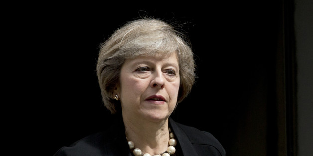 British Home Secretary and leadership candidate for Britain's ruling Conservative Party Theresa May leaves after attending a cabinet meeting at 10 Downing Street, in London, Tuesday, July 5, 2016. British Prime Minister David Cameron resigned on June 24 after Britain voted to leave the European Union in a referendum. (AP Photo/Matt Dunham)