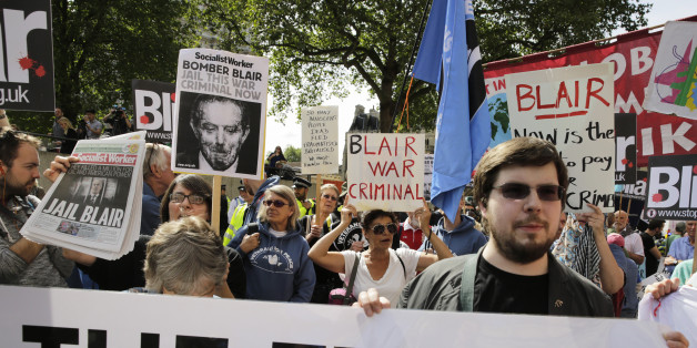 Demonstrators protest before the release of the John Chilcot report into the Iraq war, at the Queen Elizabeth II centre in London, Britain July 6, 2016. REUTERS/Paul Hackett