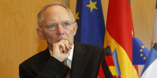 German Finance Minister Wolfgang Schaeuble attends a joint news conference with French Economy Minister Christine Lagarde after a Franco-German Economic and Financial Council at the Economy Ministry in Paris July 21, 2010. France and Germany called in a joint letter to the European Union on Wednesday for serial euro zone budget deficit offenders to be temporarily stripped of their voting rights. REUTERS/Benoit Tessier (FRANCE - Tags: POLITICS BUSINESS)