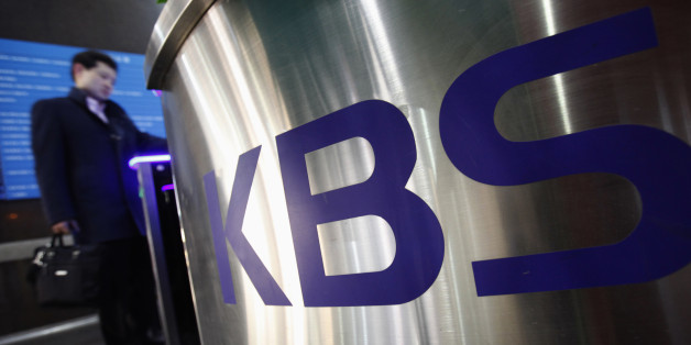 An employee of the Korean Broadcasting System (KBS) passes identification systems at KBS' main building in Seoul March 21, 2013. A hacking attack that brought down three South Korean broadcasters YTN, MBC and KBS as well as two major commercial banks, Shinhan Bank and NongHyup Bank has been identified by most commentators as Pyongyang flexing its muscles as military tensions on the divided peninsula sky-rocket. Officials in Seoul traced Wednesday's breach to a server in China, a country that has