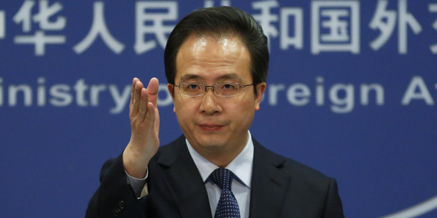 China's Foreign Ministry spokesman Hong Lei gestures during a daily briefing at the Ministry of Foreign Affairs office in Beijing, Tuesday, April 5, 2016. The ministry on Tuesday denounced as âgroundlessâ reports based on documents leaked from a Panama-based law firm that name relatives of current and retired Chinese politicians, including President Xi Jinping, as owning offshore companies. Hong said he would not further discuss the reports and declined to say whether the individuals n