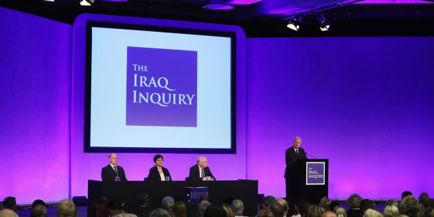 Iraq Inquiry chairman Sir John Chilcot (R) speaks as he comments on the findings of his report, inside the QEII Centre in London on July 6, 2016.Britain's then prime minister Tony Blair promised US George W. Bush in 2002 that he would be with him on Iraq 'whatever' happened, nearly a year before the invasion, Britain's Iraq War Inquiry report said on Wednesday. The decision to join the US-led invasion in 2003 on the basis of flawed intelligence, the occupation and Iraq's bloody descent into sect