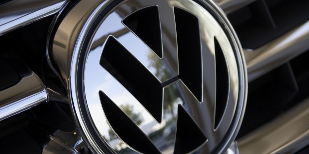 Close up of Volkswagen logo on car grill