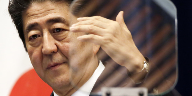 Japanese Prime Minister Shinzo Abe speaks during a press conference at the prime minister's official residence in Tokyo Wednesday, June 1, 2016. Abe said Wednesday he is postponing a sales tax hike planned for next year to help nurse along Japanâs faltering economic recovery.(AP Photo/Eugene Hoshiko)