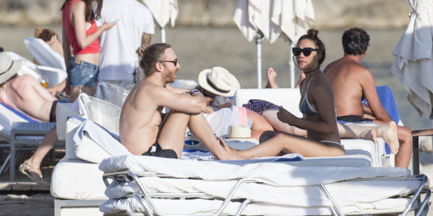 IBIZA, SPAIN - JULY 06: David Guetta and girlfriend enjoy a day at a beach club on July 6, 2016 in Ibiza, Spain. (Photo by Iconic/GC Images)