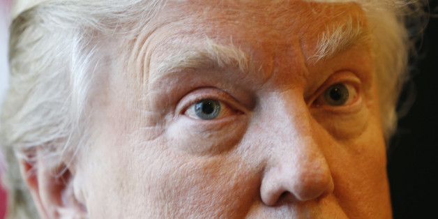 Republican Presidential candidate Donald Trump listens to a question during an interview after a rally in Virginia Beach, Va., Monday, July 11, 2016. (AP Photo/Steve Helber)