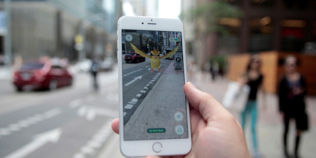 A "Pidgey" Pokemon is seen on the screen of the Pokemon Go mobile app, Nintendo's new scavenger hunt game which utilizes geo-positioning, in a photo illustration taken in downtown Toronto, Ontario, Canada July 11, 2016. REUTERS/Chris Helgren
