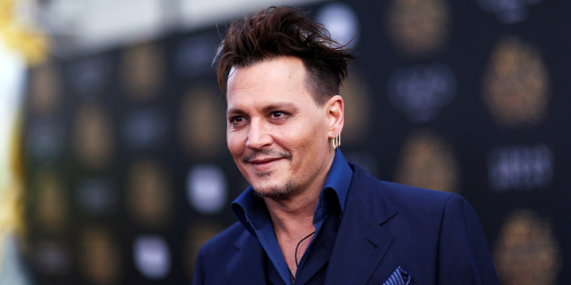 Cast member Johnny Depp poses at the premiere of "Alice Through the Looking Glass" at El Capitan theatre in Hollywood, U.S., May 23, 2016. REUTERS/Mario Anzuoni