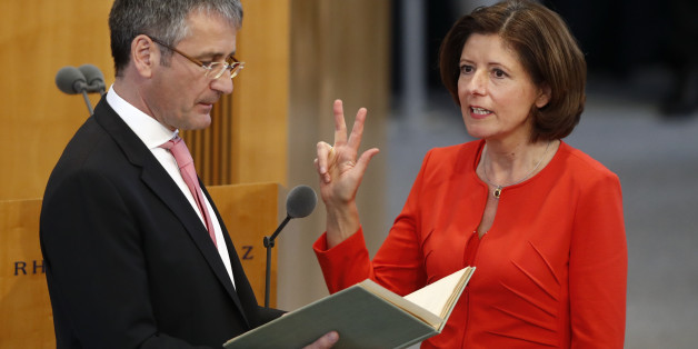 Malu Dreyer of the Social Democratic Party (SPD) (R) is sworn in as Prime Minister of the German state of Rhineland-Palatinate during a parliament session, in Mainz, Germany, May 18, 2016. REUTERS/Kai Pfaffenbach TPX IMAGES OF THE DAY