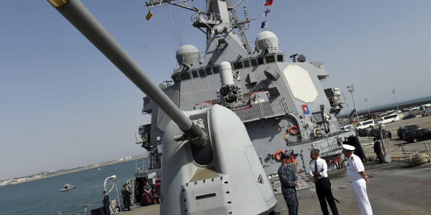U.S President Barack Obama, center, tours the USS Ross with Commander Russell Caldwell, captain of the USS Ross, right, at Naval Station Rota in Cadiz, Spain, Sunday, July 10, 2016. Obama made a brief visit to Madrid and Naval Station Rota before heading back to Washington following the NATO Summit in Warsaw, Poland. (AP Photo/Susan Walsh)
