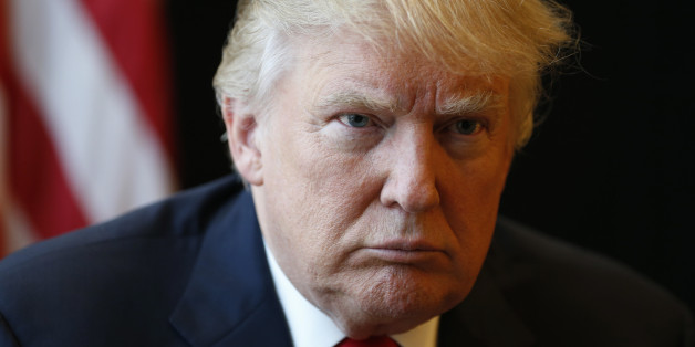 In this photo taken July 11, 2016, Republican Presidential candidate Donald Trump listens to a question during an interview in Virginia Beach, Va. In a summer of political and racial tumult, young Americans are in a dour mood: pessimistic about the fairness of the economic system, questioning the greatness of the U.S. and wondering about the effectiveness of how the nation picks its leaders. (AP Photo/Steve Helber)