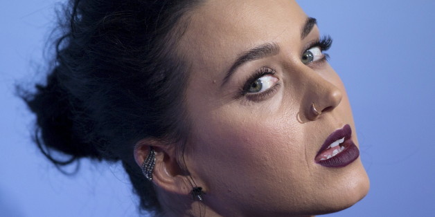 Singer Katy Perry poses at the premiere screening of "Katy Perry: The Prismatic World Tour" in Los Angeles, California March 26, 2015. REUTERS/Mario Anzuoni