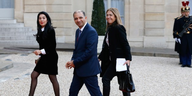 Tunisia's ambassador to France, Mohamed Ali Chihi (C) and President of France Medias Monde (FMM) Marie-Christine Saragosse (R) arrive for a state dinner in honor of the Tunisian President on April 7, 2015 at the Elysee palace in Paris. Tunisian President Beji Caid Essebsi started on April 7 a two-day visit to France. AFP PHOTO / THOMAS SAMSON (Photo credit should read THOMAS SAMSON/AFP/Getty Images)