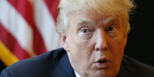 FILE - In this Monday, July 11, 2016 file photo, Republican Presidential candidate Donald Trump answers a question during an interview after a rally in Virginia Beach, Va., Monday, July 11, 2016. (AP Photo/Steve Helber, File)