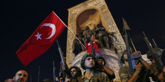 People demonstrate in front of the Republic Monument at the Taksim Square in Istanbul, Turkey, July 16, 2016. REUTERS/Murad Sezer