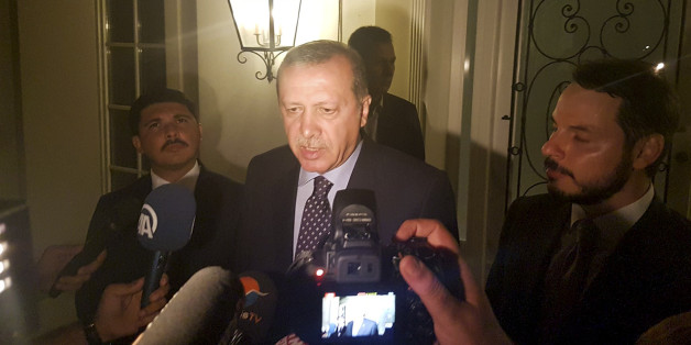 Turkish President Tayyip Erdogan speaks to media in the resort town of Marmaris, Turkey, July 15, 2016. REUTERS/Kenan Gurbuz