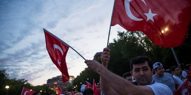 WASHINGTON, USA - JULY 15: Turks and other supporters gather in front of the White House to protest the attempted military coup in Turkey over night in Washington, USA on July 15, 2016. (Photo by Samuel Corum/Anadolu Agency/Getty Images)