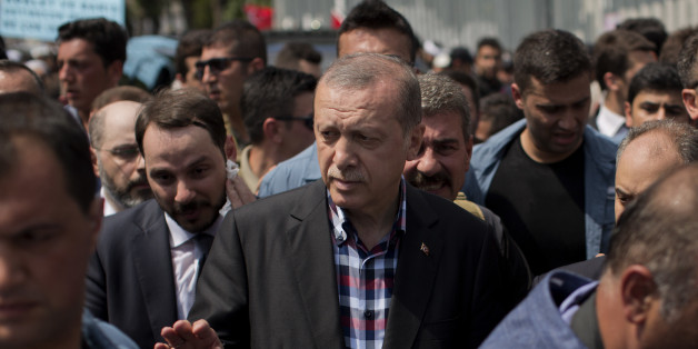 Turkish President Recep Tayyip Erdogan leaves the mosque after attending a funeral for people killed Friday while protesting against the attempted coup against Turkey's government, in Istanbul, Sunday, July 17, 2016. Rather than toppling Turkey's strongman president, a failed military coup appears to have bolstered Erdogan's immediate grip on power and boosted his popularity. (AP Photo/Emilio Morenatti)