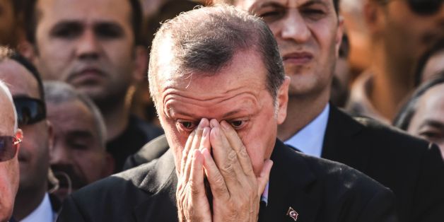 Turkey's President Recep Tayyip Erdogan (C) reacts after attending the funeral of a victim of the coup attempt in Istanbul on July 17, 2016.
Turkish President Recep Tayyip Erdogan vowed today to purge the 'virus' within state bodies, during a speech at the funeral of victims killed during the coup bid he blames on his enemy Fethullah Gulen. / AFP / BULENT KILIC (Photo credit should read BULENT KILIC/AFP/Getty Images)