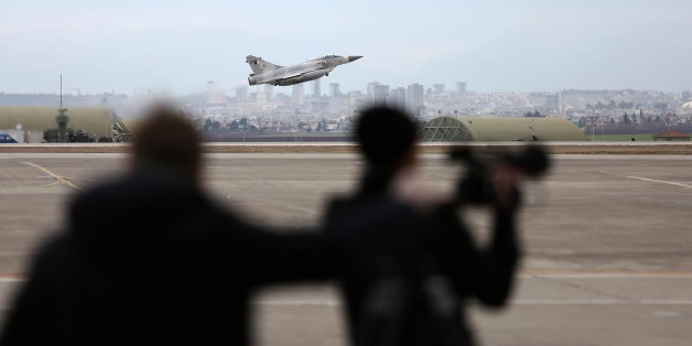 ADANA, TURKEY - JANUARY 21: A military plane take off as Turkish Defense Minister Ismet Yilmaz (not seen) and German Defence Minister Ursula Von Der Leyen (not seen) hold a press conference at Incirlik Air Base, in Adana, Turkey on January 21, 2016. (Photo by Ibrahim Erikan/Anadolu Agency/Getty Images)