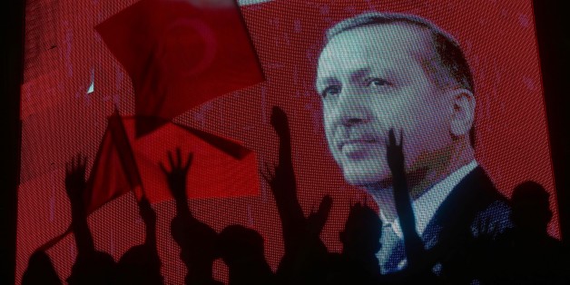 ANKARA, TURKEY - JULY 17: People wait Turkish President Recep Tayyip Erdogan (not seen) at Kizilay square as they gather to protest the 'Parallel State/Gulenist Terrorist Organization's failed military coup attempt in Ankara, Turkey on July 17, 2016. Parallel state is an illegal organization backed by U.S.-based preacher Fetullah Gulen. (Photo by Evrim Aydin/Anadolu Agency/Getty Images)