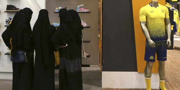 FILE - In this Friday, Dec. 11, 2015 photo, Saudi women shop at a mall in Riyadh, Saudi Arabia. A new study by Human Rights Watch says Saudi Arabiaâs male guardianship system is the most significant impediment to realizing womenâs rights in the kingdom. (AP Photo/Khalid Mohammed, File)