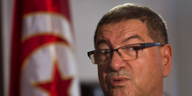 Tunisian Prime Minister Habib Essid speaks with The Associated Press during an interview ahead of a two-day conference in Madrid on combating the type of terrorism targeting foreign tourists that has hit his country twice over the last year, Spain, Tuesday, Oct. 27, 2015. (AP Photo/Emilio Morenatti)