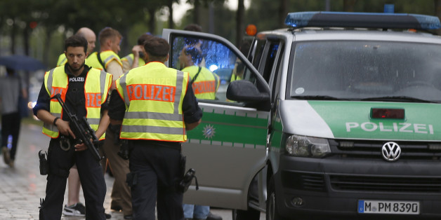 Police secure a street near to the scene of a shooting in Munich, Germany July 22, 2016. REUTERS/Michael Dalder