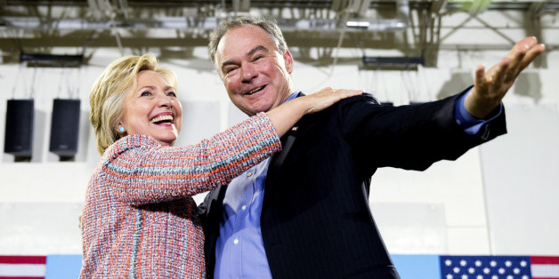 In this July 14, 2016, file photo, Democratic presidential candidate Hillary Clinton, accompanied by Sen. Tim Kaine, D-Va., speaks at a rally at Northern Virginia Community College in Annandale, Va. Clinton has chosen Kaine to be her running mate (AP Photo/Andrew Harnik)