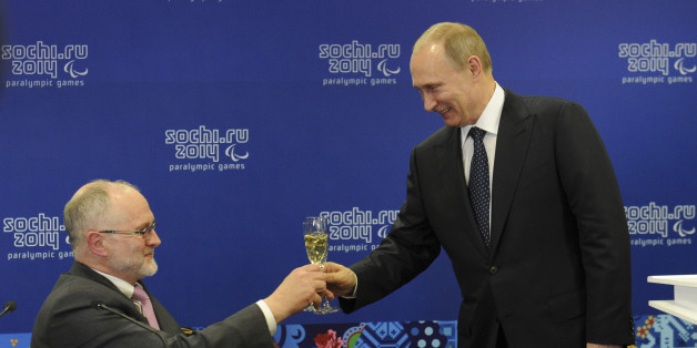 Russia's President Vladimir Putin (R) toasts with President of the International Paralympic Committee Philip Craven before the opening ceremony of the 2014 Paralympic Winter Games in Sochi, March 7, 2014. REUTERS/Mikhail Klimentyev/RIA Novosti/Kremlin (RUSSIA - Tags: POLITICS OLYMPICS SPORT) ATTENTION EDITORS - THIS IMAGE HAS BEEN SUPPLIED BY A THIRD PARTY. IT IS DISTRIBUTED, EXACTLY AS RECEIVED BY REUTERS, AS A SERVICE TO CLIENTS