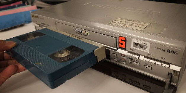 This picture shows a VHS videocassette recorder in Tokyo on July 22, 2016.The world's last videocassette recorder is set to roll off the factory line as a Japanese manufacturer ends production of the once booming home-theatre technology. Funai Electric, which says it is the world's last VCR manufacturer, pointed to a sharp decline in demand and trouble sourcing parts. / AFP / KAZUHIRO NOGI (Photo credit should read KAZUHIRO NOGI/AFP/Getty Images)