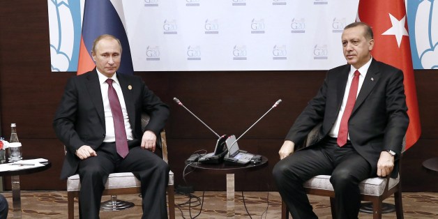Russian President Vladimir Putin meets with his Turkish counterpart Tayyip Erdogan at the Group of 20 (G20) leaders summit in the Mediterranean resort city of Antalya, on November 16, 2015 AFP PHOTO/KAYHAN OZER/POOL (Photo credit should read KAYHAN OZER/AFP/Getty Images)