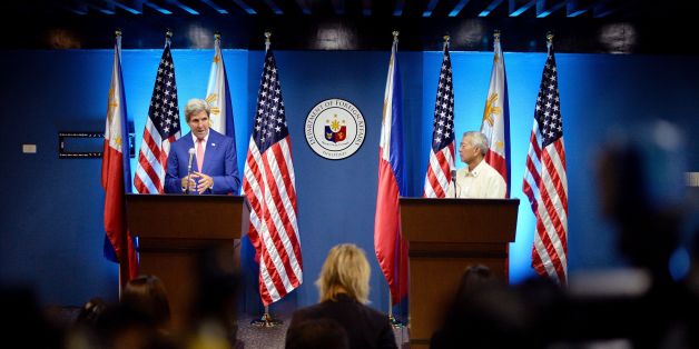 US Secretary of State John Kerry (L) speaks during a joint press conference with Philippine Foreign Secretary Perfecto Yasay (R) at the Department of Foreign Affairs building in Manila on July 27, 2016.Kerry arrived in Manila for a two-day visit after attending the Association of Southeast Asian Nations (ASEAN) meeting in Laos. / AFP / NOEL CELIS (Photo credit should read NOEL CELIS/AFP/Getty Images)