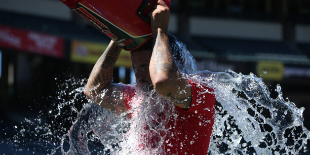 ANAHEIM, CA - AUGUST 4: Pitcher Hector Santiago #53 of the Los Angeles Angels of Anaheim takes the ALS Ice Bucket Challenge before the game against the Cleveland Indians at Angel Stadium of Anaheim on August 4, 2015 in Anaheim, California. (Photo by Josh Barber/Angels Baseball LP/Getty Images)