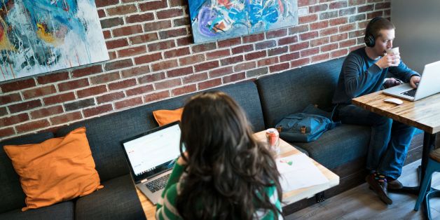 People work at the 'coworking' space Cove on February 10, 2016 in Washington, DC.
In Washington and in communities around the world, growing numbers are turning to this new kind of work environment, sharing office space with people from various fields and using their smartphones and laptops as portable offices. A survey by the website Deskmag, which tracks the trend, found 7,800 coworking spaces worldwide as of October 2015, up from 3,400 in 2013 and just 75 in 2007. These workspaces had more than 500,000 members, tenfold growth since 2011.
/ AFP / Brendan Smialowski / TO GO WITH AFP STORY by Rob Lever, ''Coworking' grows amid search for new office lifestyle' (Photo credit should read BRENDAN SMIALOWSKI/AFP/Getty Images)