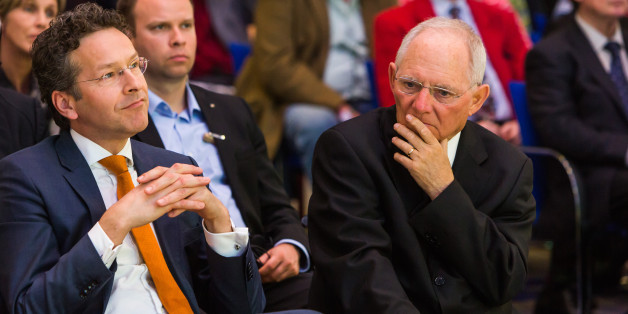 Jeroen Dijsselbloem, Dutch finance minister and head of the group of euro-area finance ministers, left, and Wolfgang Schaeuble, Germany's finance minister, wait for the start of a news conference at the finance ministry in Berlin, Germany, on Monday, April 4, 2016. Greece could again face the threat of being pushed into default and out of the euro if its current bailout review drags on into June and July, according to European officials monitoring the slow progress of Prime Minister Alexis Tsipras's negotiations with creditors. Photographer: Rolf Schulten/Bloomberg via Getty Images