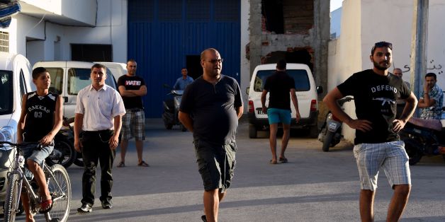 Neighbours gather outside the family home of 31-year-old Mohamed Lahouaiej Bouhlel, the driver of the truck that killed at least 84 and injured dozens in the French Riviera city of Nice, in the north-eastern Tunisian town of Msaken on July 15, 2016.
French authorities identified a Tunisian man as the driver of a truck that smashed into a Bastille Day crowd in Nice.
France's anti-terrorism prosecutor Francois Molins said the 31-year-old Lahouaiej-Bouhlel was 'completely unknown' to the intelligence services but that the attack was 'exactly in line with' calls from jihadist groups to kill. / AFP / FETHI BELAID (Photo credit should read FETHI BELAID/AFP/Getty Images)