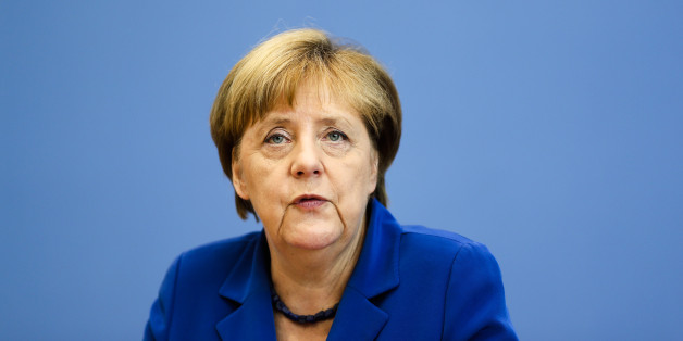 German Chancellor Angela Merkel attends a news conference in Berlin Thursday, July 28, 2016. Chancellor Angela Merkel says the fact that two men who came to Germany as refugees carried out attacks claimed by the Islamic State group "mocks the country that took them in." Merkel pledged to do everything to clear up the "barbaric acts," find out who was behind them and bring them to justice. (AP Photo/Markus Schreiber)