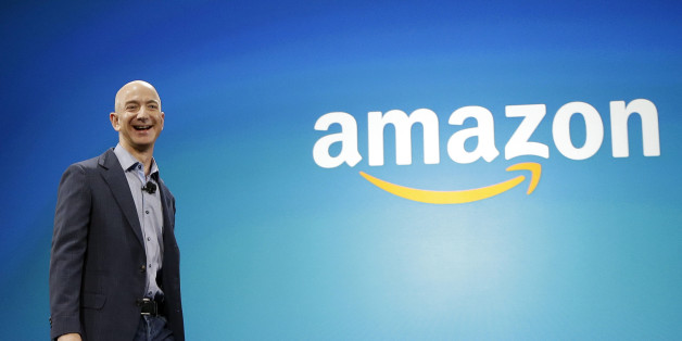 FILE - In this June 16, 2014, file photo, Amazon CEO Jeff Bezos walks onstage for the launch of the new Amazon Fire Phone, in Seattle. Bezos offered a glimpse of his vision for the future during an interview on May 31, 2016, at the Code Conference in Rancho Palos Verdes, Calif. (AP Photo/Ted S. Warren, File)